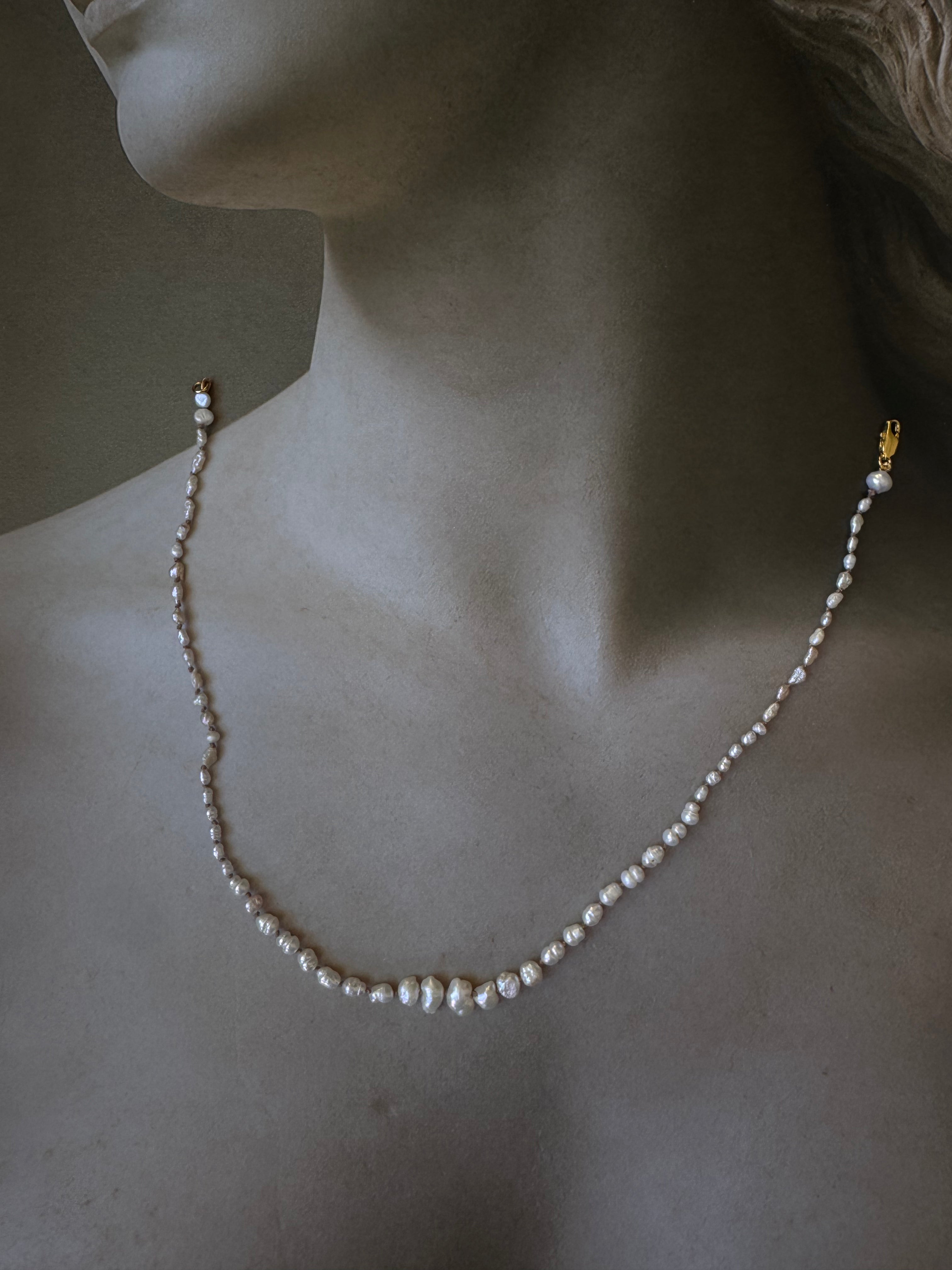hand knotted descending pearl necklace